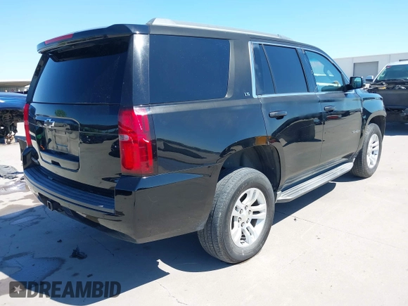 2015 Chevrolet Tahoe LS with VIN 1GNSCAKC5FR645736, listed as a IAAI auction lot 42064623 with 223,149 mi miles and . Bid and sale history available at DreamBid. Image 4.