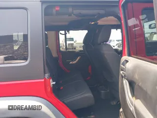 2014 Jeep Wrangler Unlimited Rubicon with VIN 1C4BJWFG0EL326979, listed as a IAAI auction lot 41913129 with 118,548 mi miles and . Bid and sale history available at DreamBid. Image 8.
