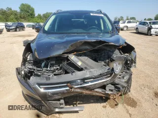2016 Ford Escape Titanium with VIN 1FMCU9J98GUB32375, listed as a Copart auction lot 59564885 with 123,548 mi miles and Salvage title. Bid and sale history available at DreamBid. Image 5.