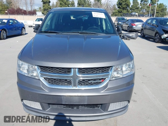 2013 Dodge Journey SE with VIN 3C4PDCAB7DT730744, listed as a IAAI auction lot 41900114 with 186,086 mi miles and . Bid and sale history available at DreamBid. Image 6.