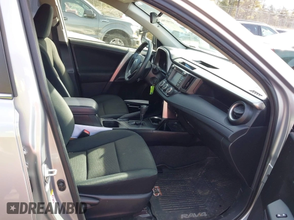 2018 Toyota RAV4 LE with VIN JTMBFREV8JJ224872, listed as a IAAI auction lot 41907962 with 104,605 mi miles and . Bid and sale history available at DreamBid. Image 5.