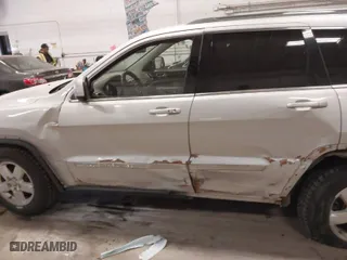 2011 Jeep Grand Cherokee Laredo with VIN 1J4RR4GG5BC690251, listed as a IAAI auction lot 41824839 with 261,010 mi miles. Bid and sale history available at carsss.com. Image 14.