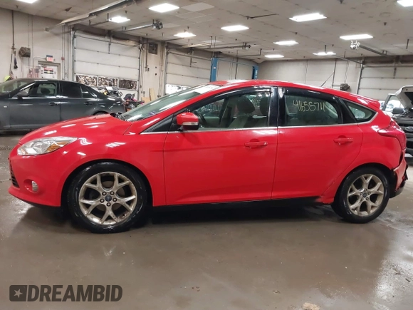 2012 Ford Focus SEL with VIN 1FAHP3M23CL460290, listed as a IAAI auction lot 41655711 with 137,743 mi miles. Bid and sale history available at carsss.com. Image 14.
