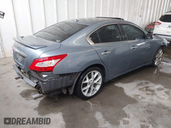 2010 Nissan Maxima SV with VIN 1N4AA5AP5AC809915, listed as a IAAI auction lot 41980433 with 181,490 mi miles and . Bid and sale history available at DreamBid. Image 4.