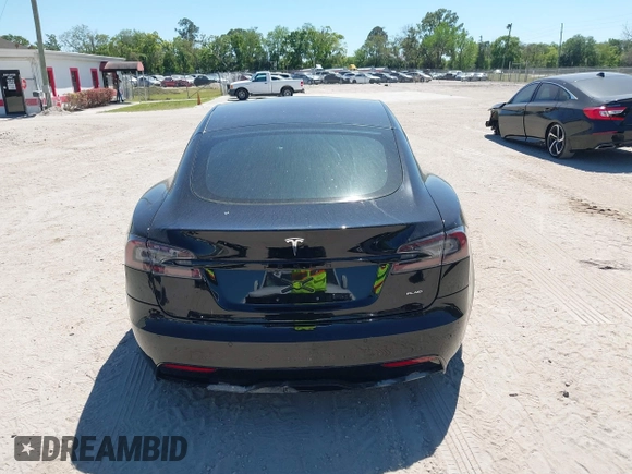 2021 Tesla Model S Plaid with VIN 5YJSA1E66MF452258, listed as a IAAI auction lot 41832000 with 42,845 mi miles and . Bid and sale history available at DreamBid. Image 17.