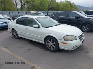 2003 Nissan Maxima GLE z VIN JN1DA31A63T433223, wystawiony jako IAAI lot #42095271 z przebiegiem 239 873 mil mil oraz . Historia ofert i sprzedaży dostępna na DreamBid. Obrazek 1.