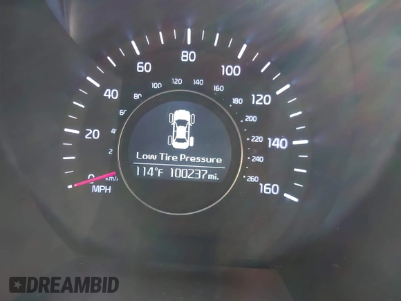2015 Kia Optima LX with VIN 5XXGM4A71FG402624, listed as a IAAI auction lot 40493003 with 100,237 mi miles. Bid and sale history available at carsss.com. Image 7.