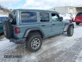 2024 Jeep Wrangler Sport S with VIN 1C4PJXDN2RW306332, listed as a IAAI auction lot 41036573 with 1,785 mi miles and . Bid and sale history available at DreamBid. Image 4.