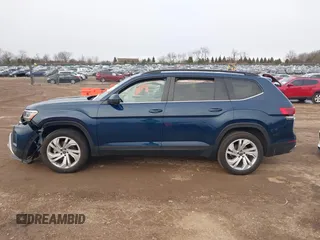 2023 Volkswagen Atlas SE z VIN 1V2KR2CA8PC504298, wystawiony jako IAAI lot #41234957 z przebiegiem 34 762 mil mil oraz . Historia ofert i sprzedaży dostępna na DreamBid. Obrazek 14.