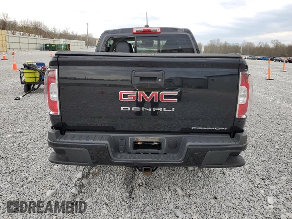 2021 GMC Canyon 4WD Denali z VIN 1GTG6EEN3M1101872, wystawiony jako Copart lot #53963085 z przebiegiem 72 791 mil mil oraz Szkoda całkowita • Salvage title. Historia ofert i sprzedaży dostępna na DreamBid. Obrazek 6.