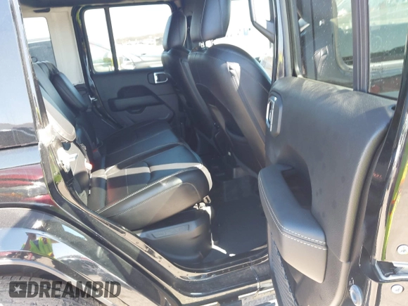 2022 Jeep Wrangler Unlimited Sahara with VIN 1C4JJXP69NW269462, listed as a IAAI auction lot 41759162 with 19,629 mi miles and . Bid and sale history available at DreamBid. Image 8.
