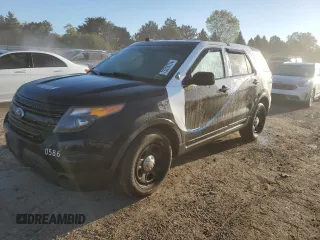 2014 Ford Utility Police Interceptor with VIN 1FM5K8AR7EGC26025, listed as a Copart auction lot 73310774 with 122,681 mi miles and Salvage Title. Bid and sale history available at carsss.com. Image 1.