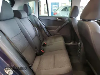 2013 Volkswagen Tiguan SE with VIN WVGBV7AX4DW518545, listed as a Copart auction lot 64585175 with 104,030 mi miles and Salvage title. Bid and sale history available at DreamBid. Image 11.
