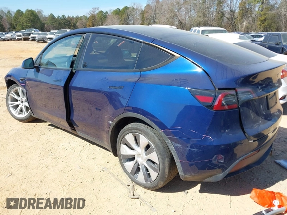 2023 Tesla Model Y Long Range with VIN 7SAYGDEE6PF847890, listed as a IAAI auction lot 41635687 with 32,846 mi miles and . Bid and sale history available at DreamBid. Image 3.
