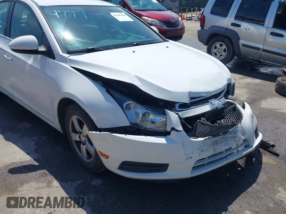 2014 Chevrolet Cruze 1LT with VIN 1G1PC5SB4E7354774, listed as a IAAI auction lot 42104388 with 136,532 mi miles and . Bid and sale history available at DreamBid. Image 16.