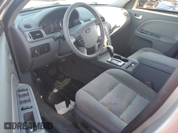 2006 Ford Five Hundred SE с VIN 1FAFP23146G157297, выставлен на аукционе Copart как лот 46508745 с пробегом 91 021 миль миль и Списание • Salvage title. История ставок и продаж доступна на DreamBid. Изображение 8.