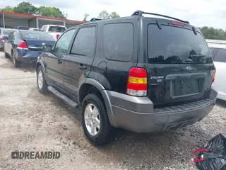2006 Ford Escape XLT with VIN 1FMYU03156KA84031, listed as a IAAI auction lot 42276336 with 136,038 mi miles and . Bid and sale history available at DreamBid. Image 3.