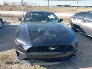 2021 Ford Mustang EcoBoost with VIN 1FA6P8TH0M5107683, listed as a IAAI auction lot 42084509 with 63,015 mi miles and . Bid and sale history available at DreamBid. Image 12.