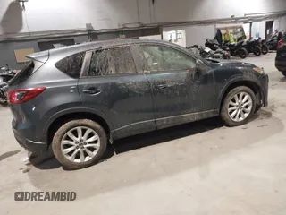 2013 Mazda CX-5 Grand Touring with VIN JM3KE2DE3D0128449, listed as a IAAI auction lot 41161558 with 108,618 mi miles. Bid and sale history available at carsss.com. Image 4.