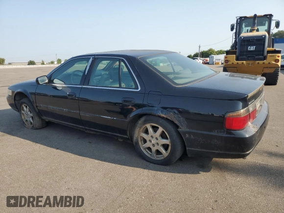 2002 Cadillac Seville Touring STS z VIN 1G6KY54922U210928, wystawiony jako Copart lot #71214564 z przebiegiem Nie podano mil oraz Czysty tytuł • Clean title. Historia ofert i sprzedaży dostępna na DreamBid. Obrazek 2.