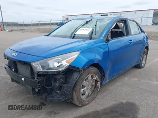 2021 Kia Rio S with VIN 3KPA25AD6ME402342, listed as a IAAI auction lot 41962804 with 41,197 mi miles and . Bid and sale history available at DreamBid. Image 2.