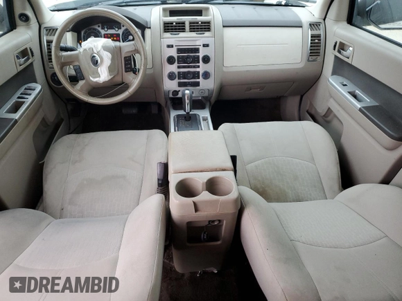 2009 Mercury Mariner with VIN 4M2CU81G49KJ16972, listed as a Copart auction lot 72354504 with 148,966 mi miles and Salvage title. Bid and sale history available at DreamBid. Image 8.