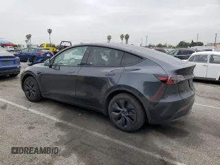 2025 Tesla Model Y Long Range with VIN 7SAYGDED8SF277469, listed as a Copart auction lot 45600195 with 442 mi miles and Salvage Title. Bid and sale history available at DreamBid. Image 2.