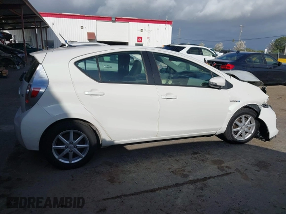 2012 Toyota Prius c One with VIN JTDKDTB38C1514005, listed as a IAAI auction lot 41903868 with 62,344 mi miles. Bid and sale history available at carsss.com. Image 14.