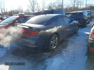 2013 Dodge Charger RT Plus with VIN 2C3CDXDT7DH558898, listed as a IAAI auction lot 41364210 with 144,351 mi miles. Bid and sale history available at carsss.com. Image 4.