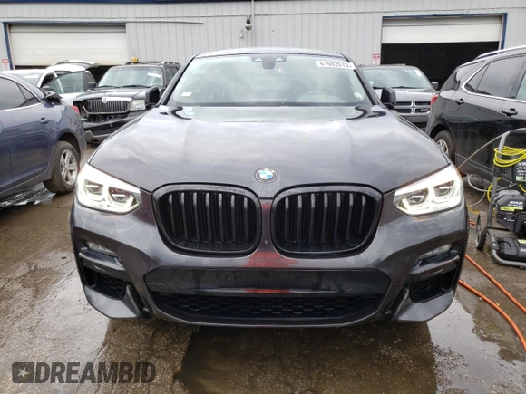 2021 BMW X4 M40i with VIN 5UX2V5C08M9E17162, listed as a Copart auction lot 67602073 with 33,879 mi miles. Bid and sale history available at carsss.com. Image 5.