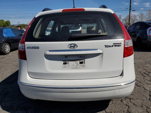2010 Hyundai Elantra Touring GLS with VIN KMHDC8AE3AU084290, listed as a Copart auction lot 45954335 with 107,443 mi miles and Salvage Title. Bid and sale history available at carsss.com. Image 6.