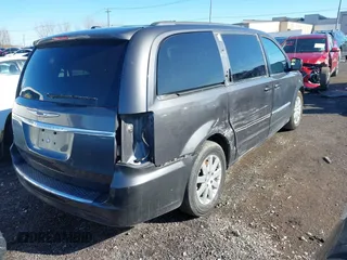 2016 Chrysler Town & Country Touring with VIN 2C4RC1BG5GR207496, listed as a IAAI auction lot 41908883 with 68,910 mi miles. Bid and sale history available at carsss.com. Image 4.