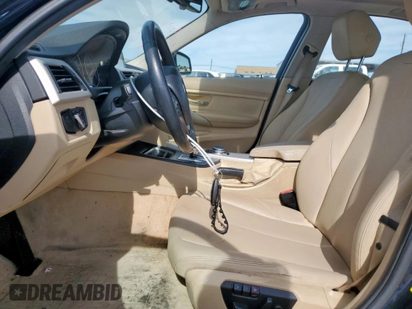 2015 BMW 3 Series 320i with VIN WBA3B1C58FK140327, listed as a Copart auction lot 57999675 with 124,437 mi miles and Salvage title. Bid and sale history available at DreamBid. Image 7.