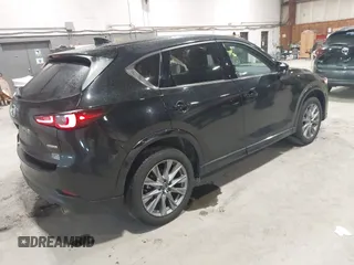 2024 Mazda CX-5 2.5 S Premium Package with VIN JM3KFBDMXR0351289, listed as a IAAI auction lot 41657792 with 22,260 mi miles. Bid and sale history available at carsss.com. Image 4.