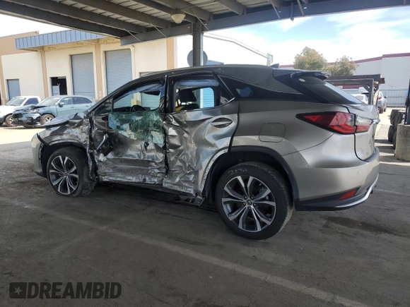 2021 Lexus RX 450h z VIN 2T2HGMDA0MC067651, wystawiony jako Copart lot #52595355 z przebiegiem Nie podano mil oraz Szkoda całkowita • Salvage title. Historia ofert i sprzedaży dostępna na DreamBid. Obrazek 2.