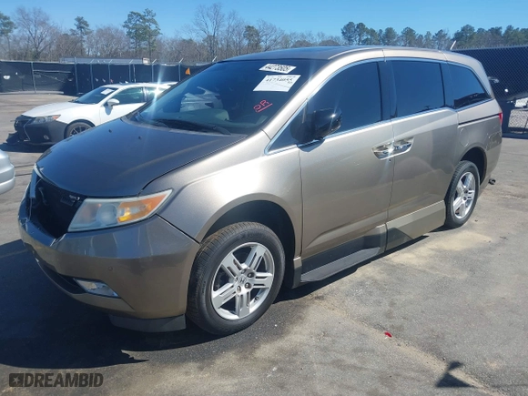 2013 Honda Odyssey Touring with VIN 5FNRL5H96DB066008, listed as a IAAI auction lot 41734055 with 120,292 mi miles. Bid and sale history available at carsss.com. Image 2.