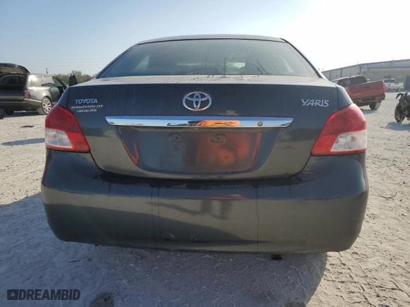 2011 Toyota Yaris with VIN JTDBT4K33B1404938, listed as a Copart auction lot 44312955 with 0 mi miles and Salvage Title. Bid and sale history available at carsss.com. Image 6.