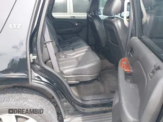 2014 Chevrolet Tahoe LS z VIN 1GNSCAE05ER128680, wystawiony jako IAAI lot #42388442 z przebiegiem 240 611 mil mil oraz . Historia ofert i sprzedaży dostępna na DreamBid. Obrazek 8.