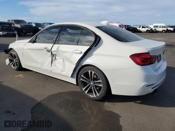 2018 BMW 3 Series 330e iPerformance with VIN WBA8E1C52JA756990, listed as a Copart auction lot 88815495 with 64,081 mi miles and Non Repairable. Bid and sale history available at carsss.com. Image 2.