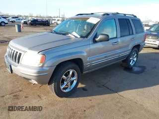 2001 Jeep Grand Cherokee Limited with VIN 1J4GW58N61C670589, listed as a IAAI auction lot 41817712 with 185,905 mi miles. Bid and sale history available at carsss.com. Image 2.