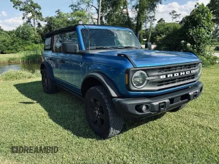 2023 Ford Bronco with VIN 1FMDE5DH1PLA85211, listed as a Copart auction lot 56986915 with 33,535 mi miles and Salvage Title. Bid and sale history available at DreamBid. Image 1.