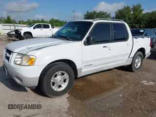 2002 Ford Explorer Sport Trac Value z VIN 1FMZU67E22UD08097, wystawiony jako IAAI lot #42729751 z przebiegiem 186 677 mil mil oraz . Historia ofert i sprzedaży dostępna na DreamBid. Obrazek 2.
