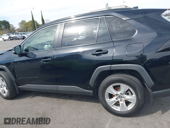 2019 Toyota RAV4 XLE with VIN JTMW1RFV7KJ011556, listed as a IAAI auction lot 41682178 with 72,795 mi miles. Bid and sale history available at carsss.com. Image 14.