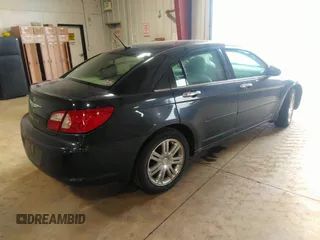 2007 Chrysler Sebring Limited with VIN 1C3LC66M77N642086, listed as a IAAI auction lot 42107367 with 115,043 mi miles and . Bid and sale history available at DreamBid. Image 4.