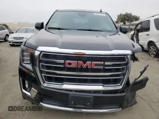 2023 GMC Yukon XL SLT with VIN 1GKS2GKD5PR363433, listed as a Copart auction lot 85979734 with 61,957 mi miles and Salvage Title. Bid and sale history available at DreamBid. Image 5.