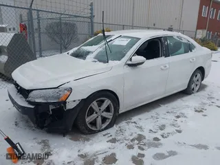 2012 Volkswagen Passat SE with VIN 1VWBP7A35CC052679, listed as a IAAI auction lot 41268199 with 125,691 mi miles. Bid and sale history available at carsss.com. Image 2.