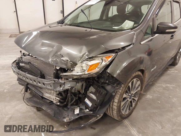 2018 Ford C-Max Titanium with VIN 1FADP5DU5JL101340, listed as a IAAI auction lot 41816730 with 102,207 mi miles and . Bid and sale history available at DreamBid. Image 6.