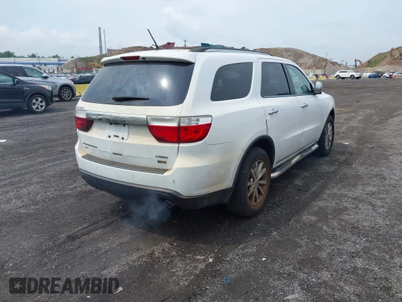 2013 Dodge Durango Crew with VIN 1C4RDJDG9DC667338, listed as a IAAI auction lot 42639559 with 137,020 mi miles and . Bid and sale history available at DreamBid. Image 4.