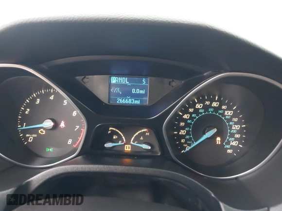 2012 Ford Focus SE z VIN 1FAHP3F29CL141649, wystawiony jako IAAI lot #40782821 z przebiegiem 266 683 mil mil oraz . Historia ofert i sprzedaży dostępna na DreamBid. Obrazek 7.