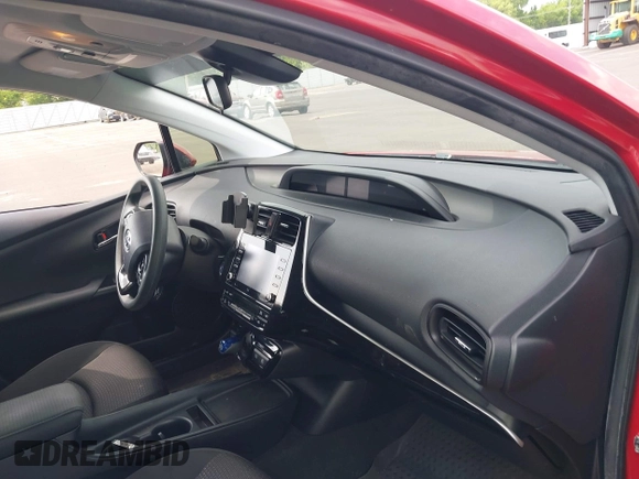 2021 Toyota Prius LE with VIN JTDL9MFU0M3029880, listed as a IAAI auction lot 42450003 with 91,558 mi miles and . Bid and sale history available at DreamBid. Image 5.